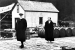 114494-A – Alexander Graham Bell and Mabel Hubbard Bell stand on a wharf at Beinn Bhreagh, in fro